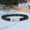 Bronzite and Black Tourmaline Infinity Charm Bracelet