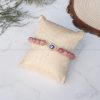 Rhodochrosite Evil Eye Charm Bracelet