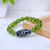 Heated Peridot with Tibetan 3 Eye Dzi Bead Bracelet - Image 3