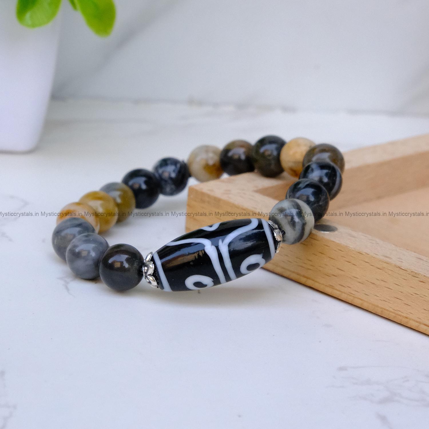 Petrified Wood with Tibetan 3 Eye Dzi Bead Bracelet - Image 3